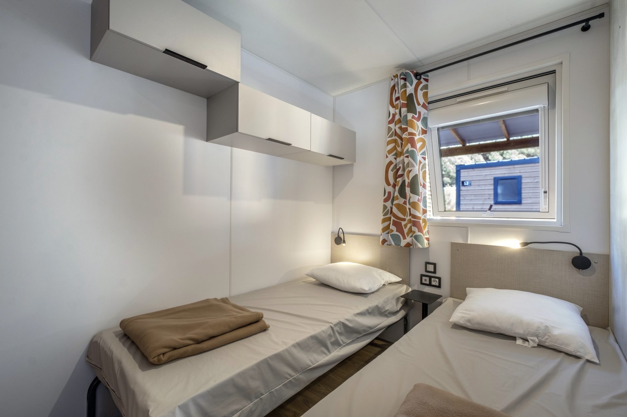 Location  CLIMATISE : Mobile-home, 4 personnes, 2 chambres, Climatisation, Lave-vaisselle, Terrasse couverte au camping Le Suroit - 5