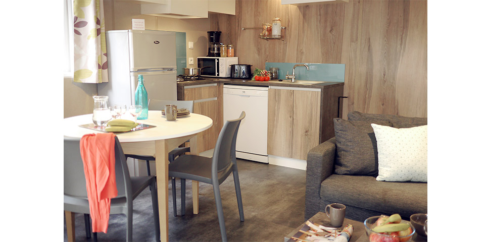 Location  QUARTIER: TV chalet, 6 people, 3 bedrooms, Covered terrace au camping Le Suroit - 6