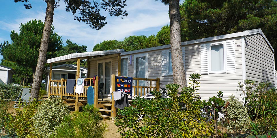 Location  QUARTIER: TV Mobile home, 6 people, 3 bedrooms, Covered terrace au camping Le Suroit - 4