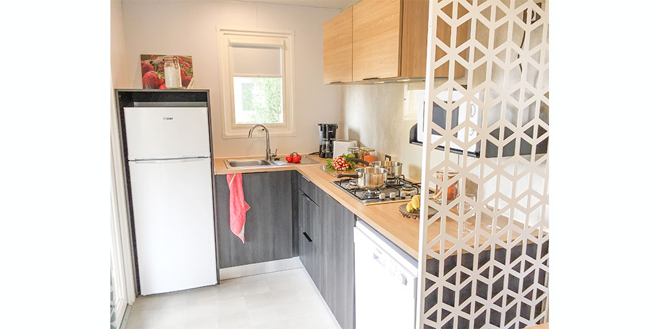 Location  QUARTIER: TV Mobile home, 4 people, 2 bedrooms, covered terrace au camping Le Suroit - 3
