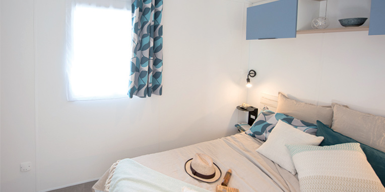 Location  ARCHIPEL : Mobile-Home, 6/8 personnes, 3 chambres, lave-vaisselle (2 mobil homes Îlots avec terrasse commune couverte) au camping Le Suroit - 4