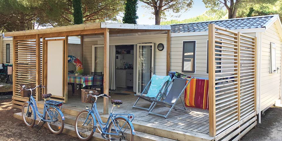 Location  QUARTIER: TV Mobile home, 5 people, 2 bedrooms, Covered terrace au camping Le Suroit - 1