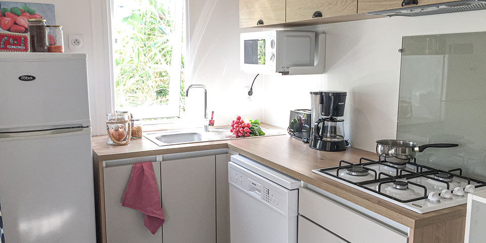 Location  QUARTIER: TV Mobile home, 5 people, 2 bedrooms, Covered terrace au camping Le Suroit - 2