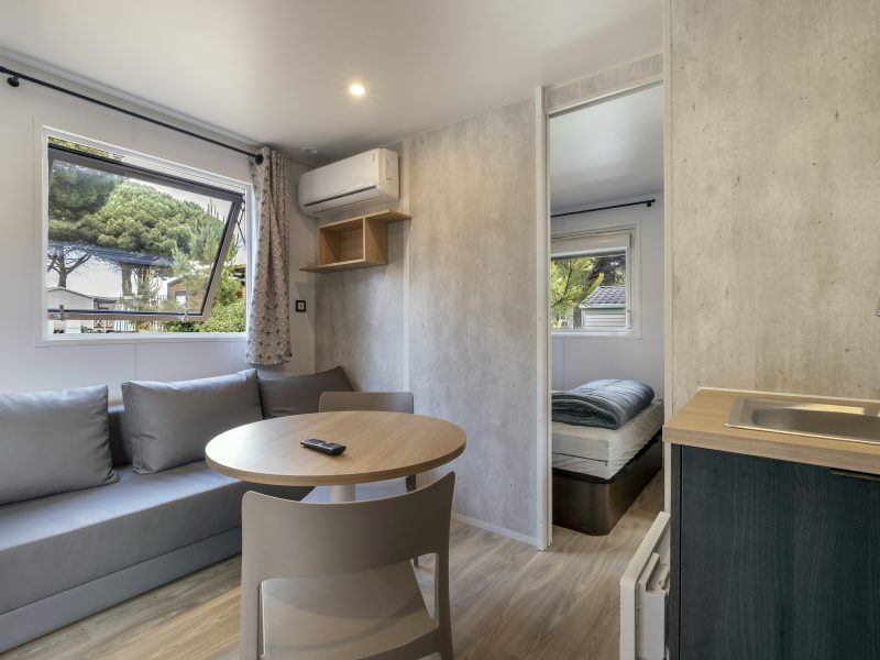 Location  ARCHIPEL : 8 personnes, 4chambres avec climatisation (2 Mobile-Homes îlots avec terrasse commune couverte) au camping Le Suroit - 8