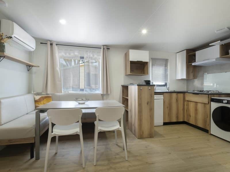 Location  ARCHIPEL : 14 personnes, 7 chambres, jacuzzi privatif et climatisation (2 mobil homes Îlots avec terrasse commune couverte) au camping Le Suroit - 7